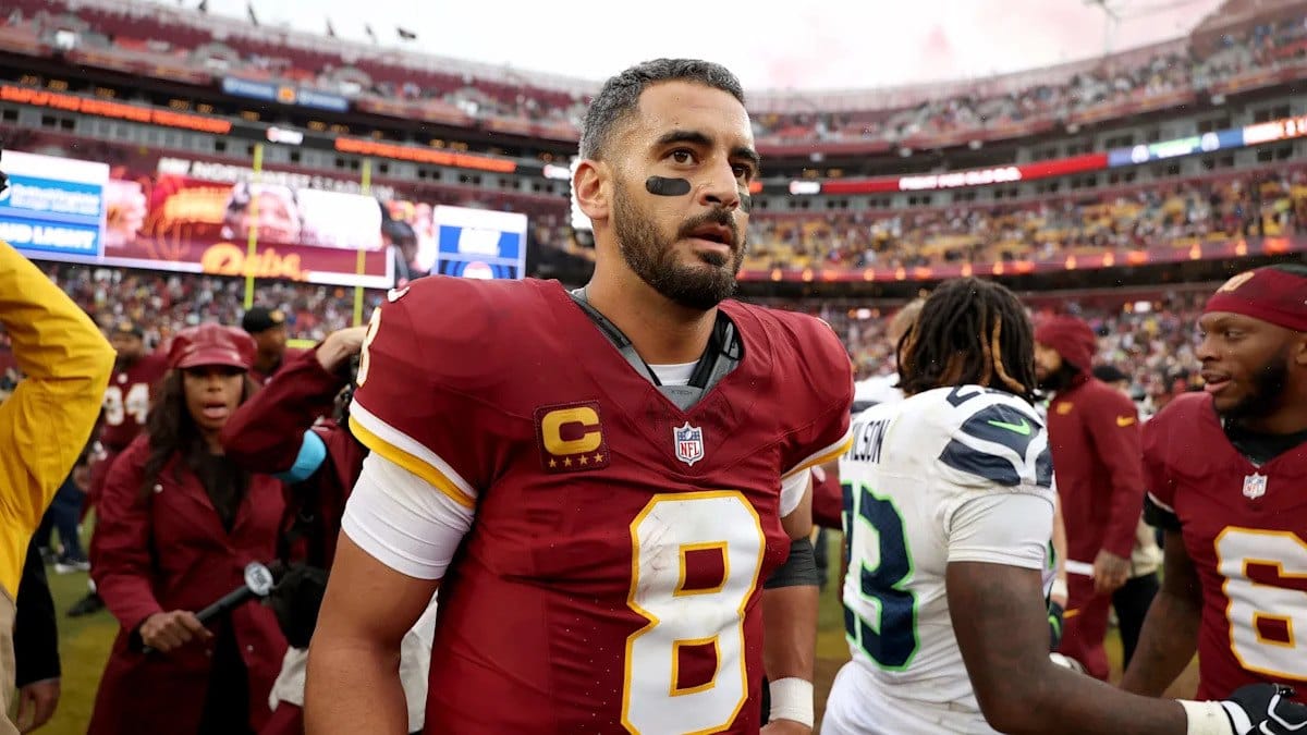 Mariota beats the champs, but Leo Chenal's neck injury shadows the win