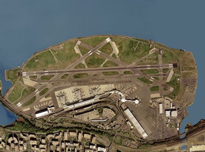 Which airport is closer to DC, Reagan or Dulles?